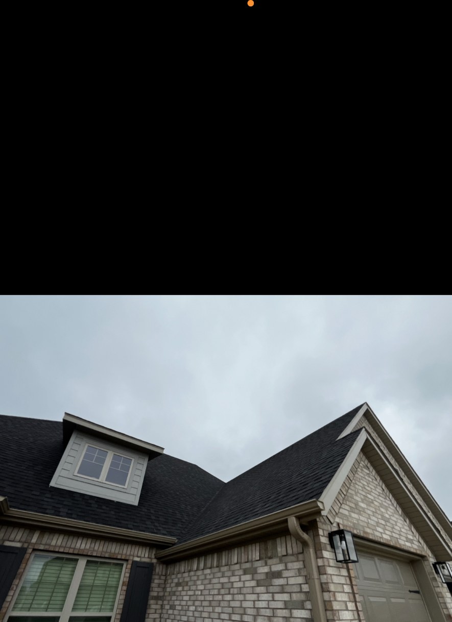 Finished roofing & gutters by APEX Construction & Landscaping
